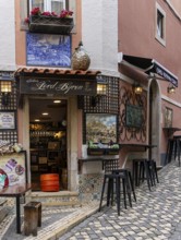 Bars, restaurants and murals on Rue da Fonte da Pipa, Sintra, Lisbon, Portugal