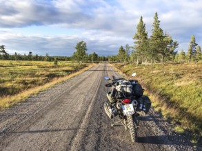 Idre, Dalarnas län, Sweden, BMW G 650 GS Sertao Enduro motorcycle stands on a country road with a