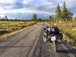 Idre, Dalarnas län, Sweden, BMW G 650 GS Sertao enduro motorcycle with full camping equipment on a