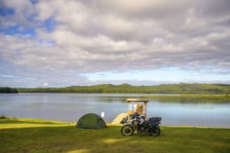 Rörström, Dorotea, Västerbotten, Sweden, tent and BMW G 650 GS Sertao Enduro motorcycle on a