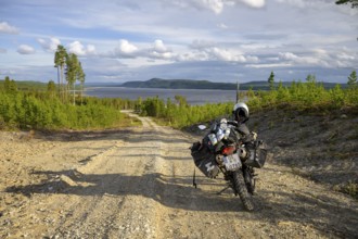 Lövdalen, Jämtland County, Sweden, BMW G 650 GS Sertao enduro motorcycle on a dirt road with views
