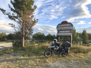 Funäsdalen, Jämtlands län, Sweden, Rural scene with a BMW G 650 GS Sertao Enduro motorcycle next to