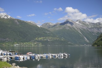 Norddal, Møre og Romsdal province, Norway, harbour with boats against a backdrop of high mountains