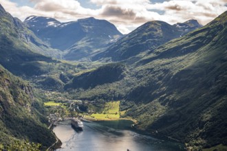 Geiranger, Møre og Romsdal province, Norway, low-lying valley at Geirangerfjord and a ship in the