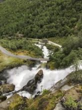 Briksdalsbre, Vestland, Norway, waterfall originating from the Brikdalsbreen glacier flows