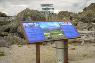 Alvdal, Innlandet, Norway, information board on the hiking route in front of a rocky landscape and
