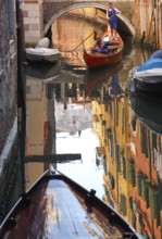 Reflections in a canal, Venice, Veneto, Italy