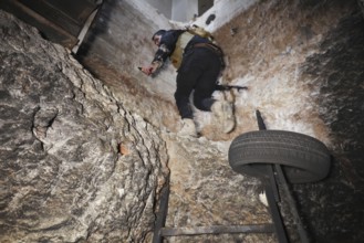 In Aleppo, Syria on January 10, 2026, members of the Syrian Army inspect underground tunnels