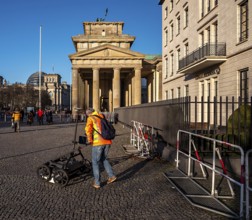 Measurement of the walkway at the Brandenburg Gate near the American Embassy, Berlin, Germany