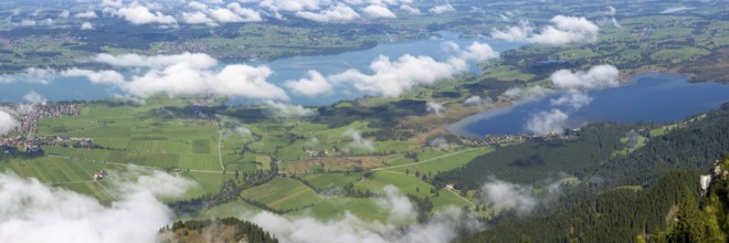 Panorama from Tegelberg, 1881m, of the cloud-covered Forggensee and Bannwaldsee, Ostallgäu,
