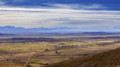 Extensive landscape with fields and mountains on the horizon, The landscape of the Altiplano in the
