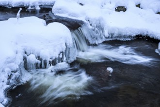 Ilsenburg, Saxony-Anhalt, Germany, Small waterfall of the river Ilse in the Harz National Park on