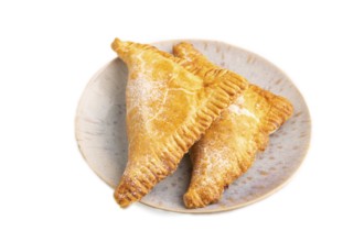 Triangles Pie, Puff Pastry, Samsa with cherry jam isolated on white background, side view, close up