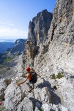 Climbers on the Via Ferrata Bocciere Centrale via ferrata, spectacular mountain landscape with