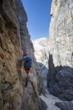 Climbers on the Via Ferrata Bocciere Centrale via ferrata, spectacular mountain landscape with