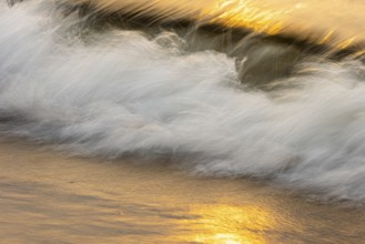 Waves at sunset on the west beach of Fischland-Darß-Zingst, Baltic Sea, Ahrenshoop,