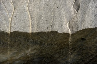 Meltwater at a glacier cave, underground glacier stream, Castner Glacier, Delta Range, Alaska