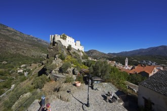 Citadel with the bastion Eagle's Nest, mountain town of Corte, on the right the village of Corte,