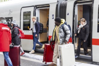 Winter in Stuttgart. There is also a closed layer of snow in the main train station. Travelers with