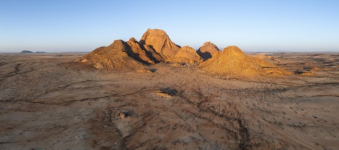 Aerial view, sunset, mountains in the desert, Spitzkoppe summit, Namib desert, Namibia