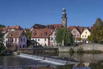 View of the old town with St. Johannis Church, in front the historic Schleifmühle and Pegnitz