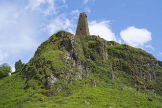 Historic tower ruin on a rocky hill under clear blue sky in nature, Zion Tower, Sioni, Georgian