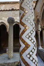 Famous cloister of the Benedictine monastery, decorated column, Cathedral of Monreale, Santa Maria