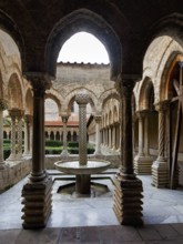 Famous Benedictine monastery cloister, decorated columns, double columns and fountains, Cathedral
