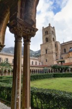 Famous cloister of the Benedictine monastery, decorated double columns, Cathedral of Monreale,
