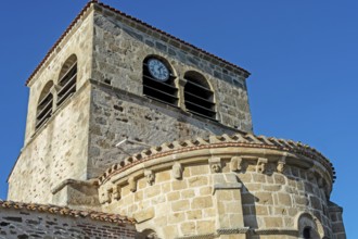 Issoire. Pillar (The Annunciation made to Mary) . The figures are illuminated by colorful light
