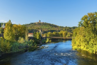 Suspension bridge of Coudes village on river Allier. Puy de Dome. Auvergne Rhone Alpes. France