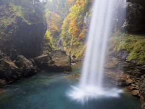 Waterfall mountain list in autumn-colored surroundings, Linthal, Klausenpass, Canton of Glarus,