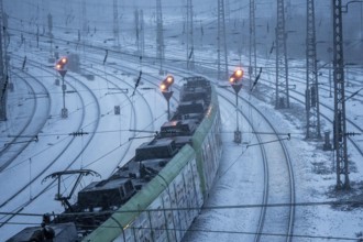 Winter weather, snowfall, regional train train, regional traffic, on the route east, in front of