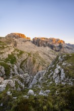 View of rocky mountain peaks of the Brenta Mountains at sunset, Alpenglühen, mountain landscape on