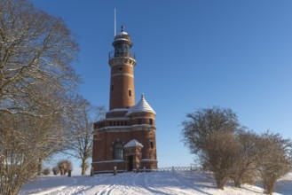Holtenau lighthouse at the entrance of the Kiel Canal in winter, west bank of the Kiel Fjord,