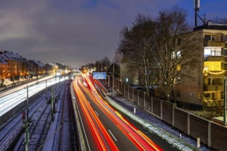 Autobahn A40, Ruhrschnellweg, near Essen at the Frohnhausen junction, evening traffic in winter,