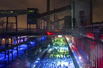 Ice rink at the Zollverein coking plant, ice skating with music and many lighting effects, Essen,
