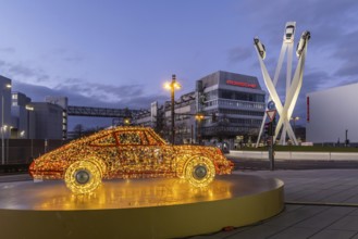 Highlights on Porscheplatz in Zuffenhausen. In front of the Porsche Museum and the car