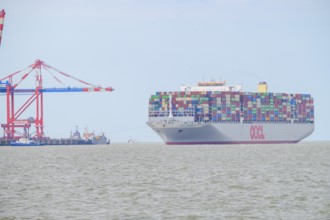 The container ship OOCL Germany with 59 m width and 400 m length of one of the largest container
