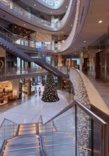 Stilwerk Düsseldorf, interior view, Christmassy decorated elliptical atrium with surrounding