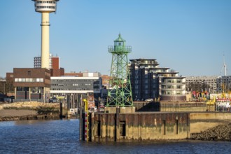 Skyline of Bremerhaven, seen across the Weser, lighthouse at the mouth of the Geeste, harbour of