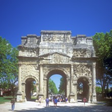 People, children, Arc de Triomphe in Orange, Provence, southern France, June 1999, vintage, retro,