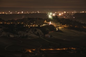New Year's Eve view from Kapellberg near Fellbach towards Rotenberg. View of the grave chapel in