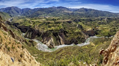 Panorama of a mountain landscape with terraced fields and a river, The landscape of the Colca
