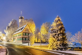St. Stephen's Church Westerheim in winter with Christmas tree. hoarfrost. Westerheim, Alb-Danube