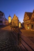 December 25, 2025: Christmastime at Plönlein — Rothenburg ob der Tauber, Bavaria, Germany. Festive