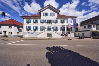 Town Hall, flags on flagpoles, 750 years of Gutach Black Forest Railway, European flag, pedestrian