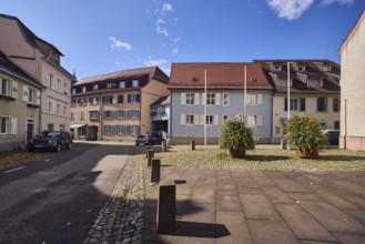 Houses, residential buildings, apartment buildings, façade with windows and shutters, dormers,