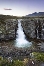 Storulfossen waterfall in Rondane National Park, Norway