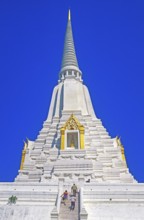 People, Chedi, white and gold temple Wat Phukao Thong, Ayutthaya, Thailand, December 2002, vintage,